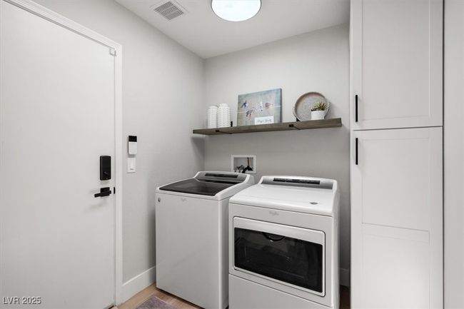 All appliances STAY. Laundry with cabinets | Image 30