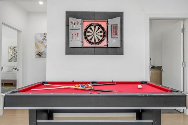 Recreation room with hardwood / wood-style flooring and billiards | Image 4