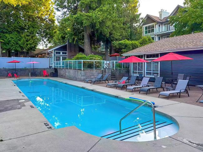 Community pool with a patio | Image 10