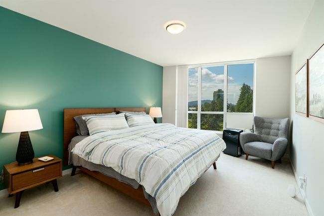 Bedroom featuring carpet floors and baseboards | Image 18