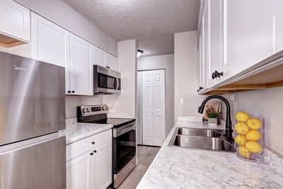 104 - 50 E Highline Circle, Condo with 2 bedrooms, 1 bathrooms and 1 parking in Centennial CO | Image 1