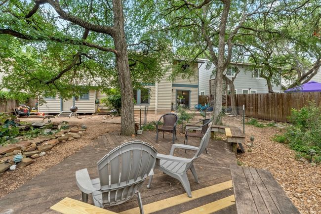 A spacious wood deck gives you the perfect perch to enjoy morning coffee, afternoon sunshine, or evenings surrounded by the sounds of the pond | Image 28