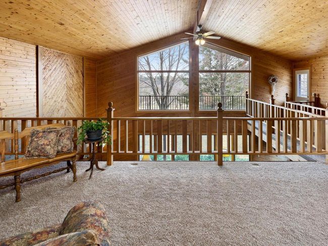 This charming nook is ideal for quiet moments—read a book, play a game, do a puzzle, or just enjoy the view. | Image 42
