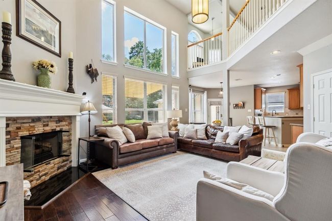 Family room just off the kitchen open to the upstairs. Plenty of natural light fill the space. | Image 7