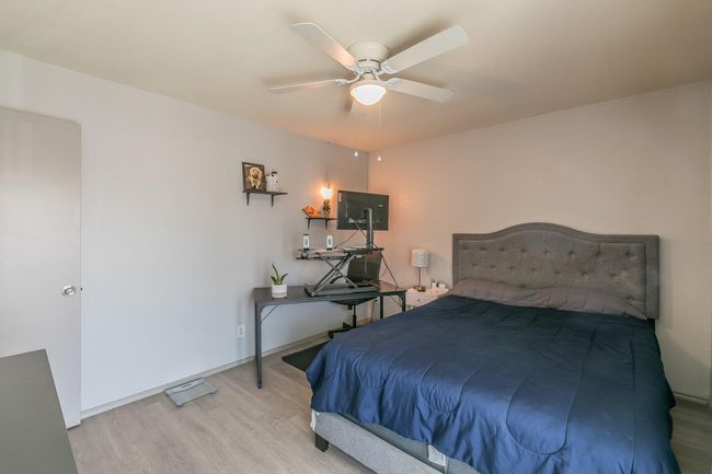 Bedroom with ceiling fan and light hardwood / wood-style flooring | Image 14
