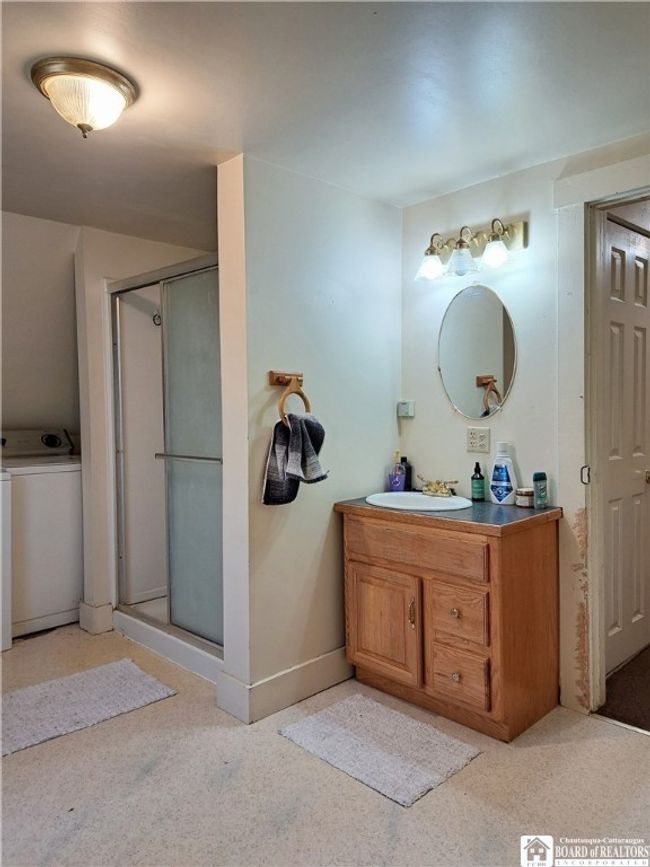 Upper Apartment - Bathroom & Laundry | Image 42