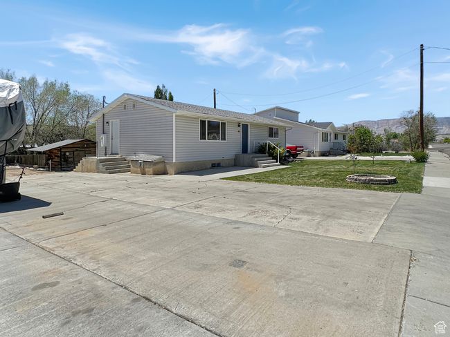 View of front of house featuring a front yard and entry steps | Image 34