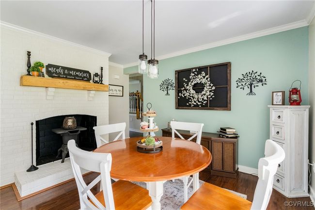 Fireplace and brick accent wall in the kitchen | Image 15