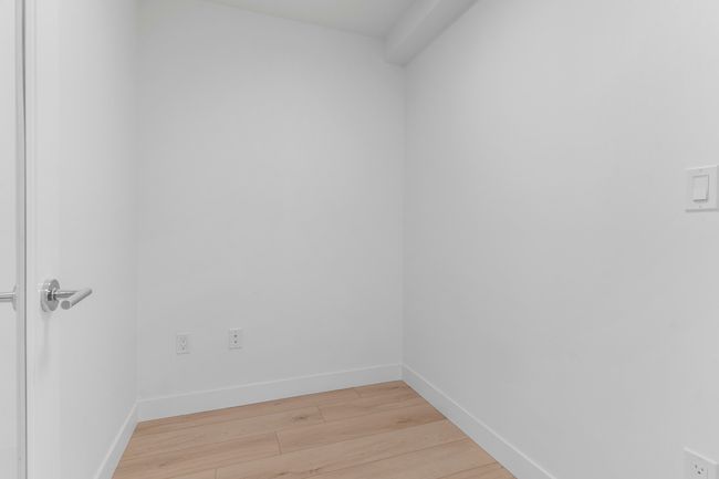 Empty room with light wood-type flooring and baseboards | Image 16