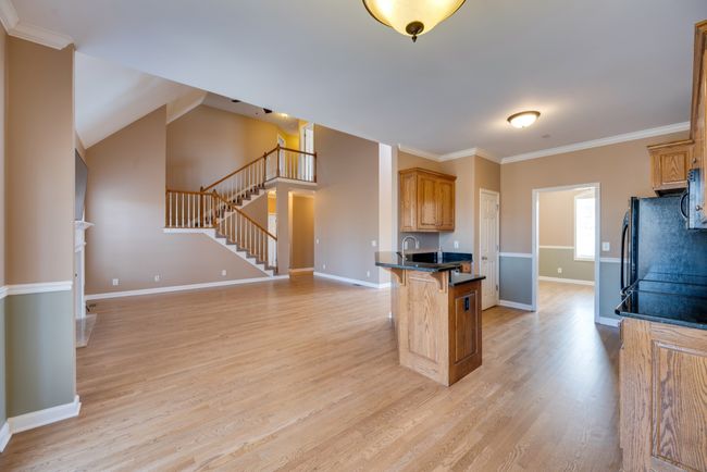 View of the living room from the kitchen. | Image 15