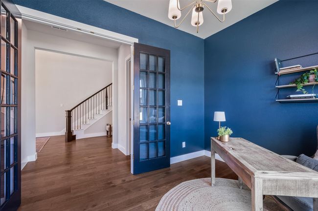 Elegant double French door entry into this beautiful home office space. | Image 19