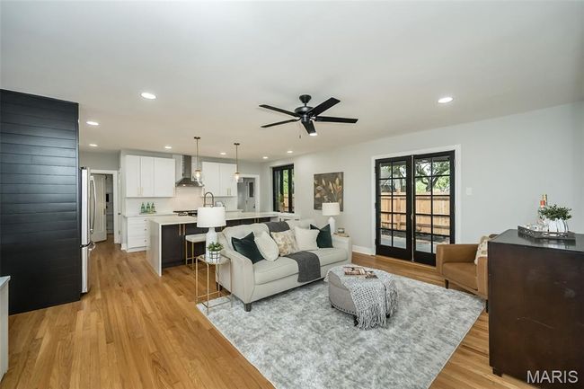 Large open kitchen with ~8FT island with waterfall edges. | Image 7