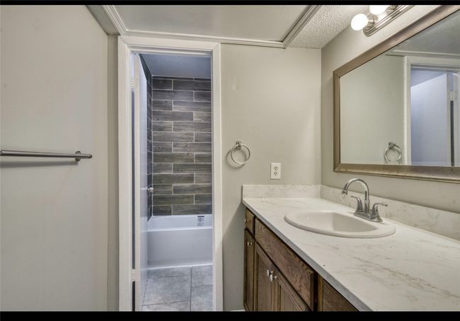 Full bathroom featuring vanity | Image 21