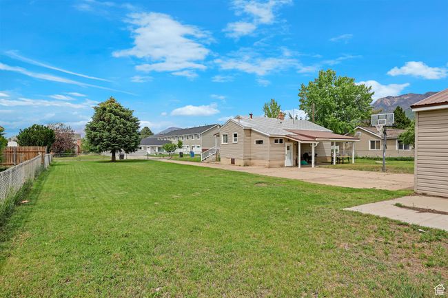 View of yard with concrete driveway | Image 31