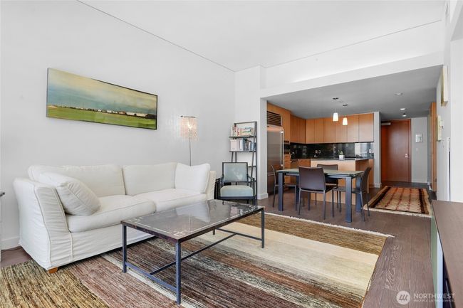 Open floor plan with living/dining area and modern kitchen | Image 11