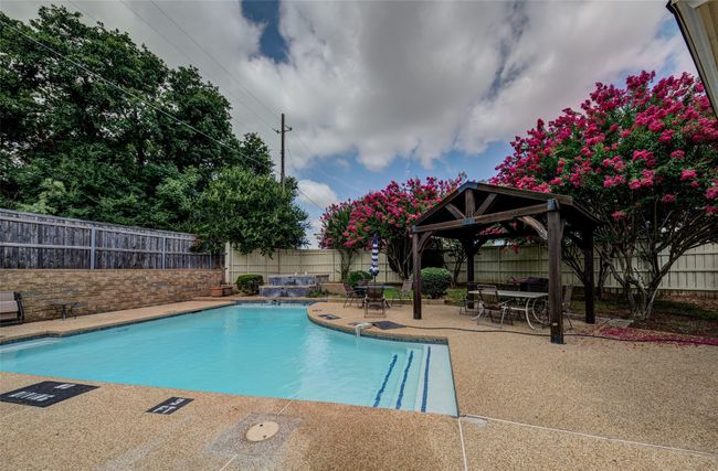 View of pool featuring a gazebo, a patio, and a fenced backyard | Image 31