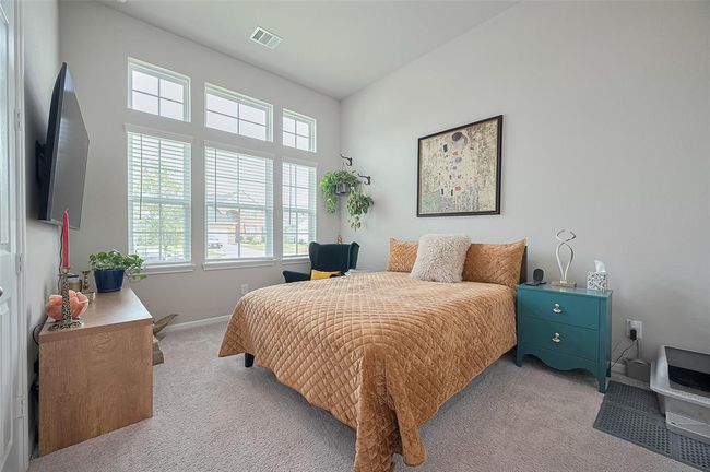 Front secondary bedroom with lots of natural light | Image 8