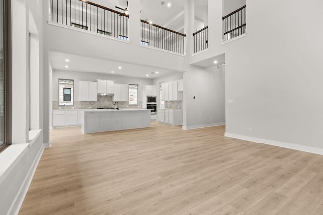 Family Room with soaring ceiling to Open Concept Kitchen | Image 18