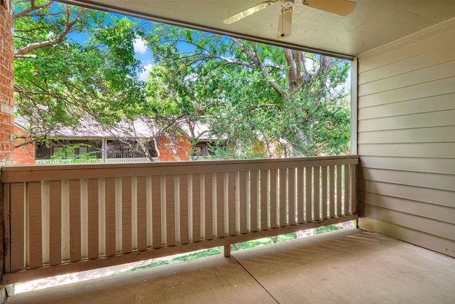 Balcony featuring a ceiling fan | Image 18