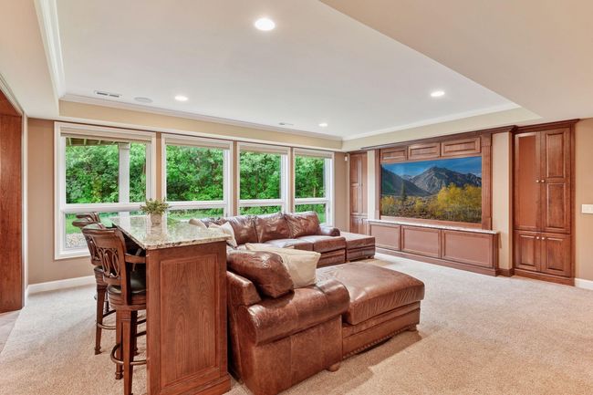 Entertainig watch games on island or couch | Image 45