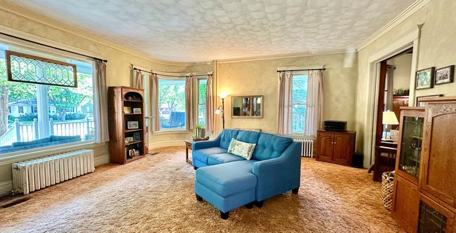 Living Room with curved corner window | Image 22