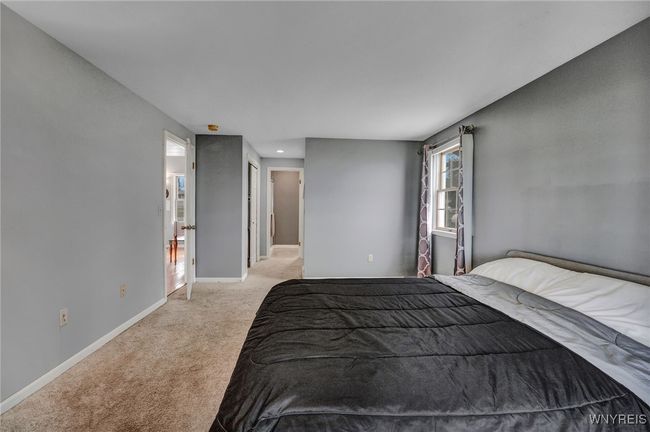 First floor bedroom with walk in closet and ensuite. | Image 22