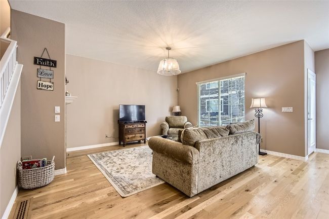 Open Concept with view of Living Room from Kitchen & Dining Room | Image 4