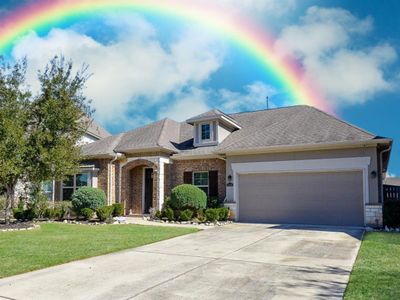 Situated on a large 8, 358 sq. ft. cul-de-sac lot, this immaculate one-story gem is 2, 649 sq. ft. A beautiful stone style tile floor, you will be greeted by front porch recessed LED lighting and a Nest Video doorbell. | Image 3