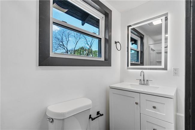 Upstairs Bathroom featuring toilet and vanity | Image 41