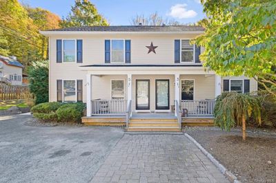 View of front facade featuring a porch | Image 3