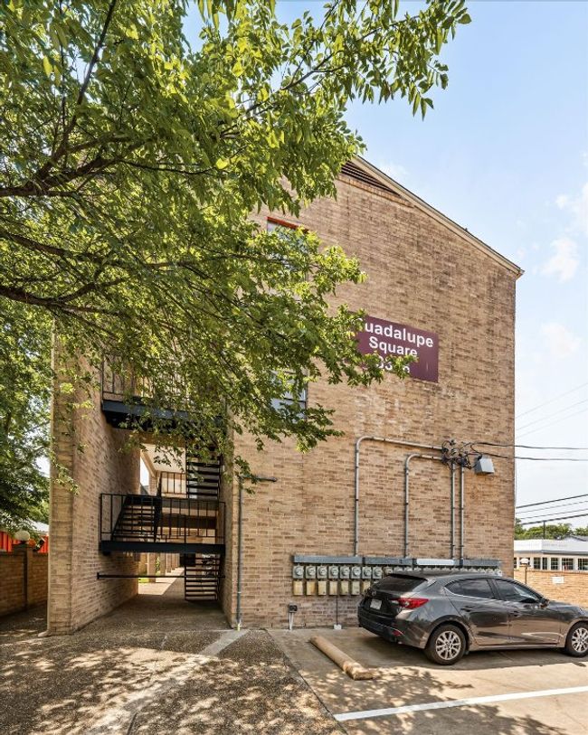 View of property featuring uncovered parking | Image 36