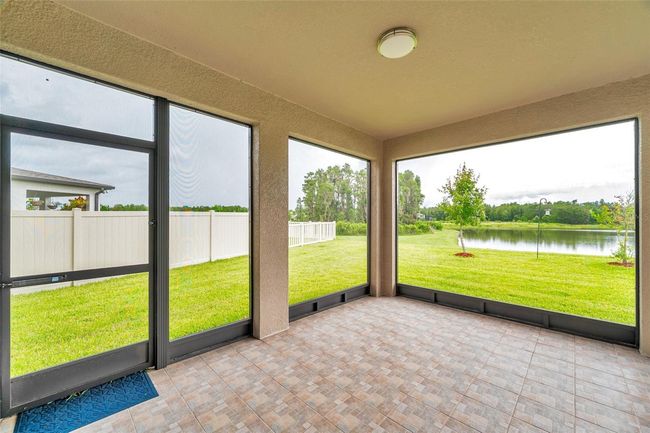 large, screened patio with water view | Image 54