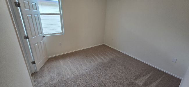 3rd bedroom carpeted with baseboards | Image 28