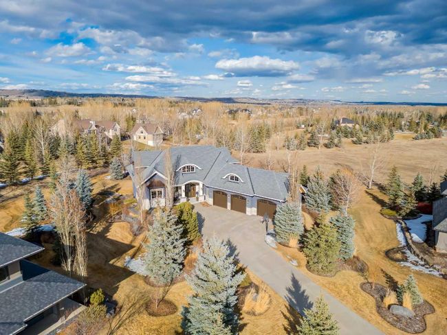 36 Mackenas Way, Home with 5 bedrooms, 4 bathrooms and 6 parking in Rural Rocky View County AB | Image 2