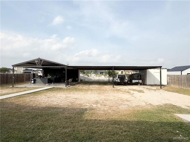 View of outbuilding with a carport and driveway | Image 20