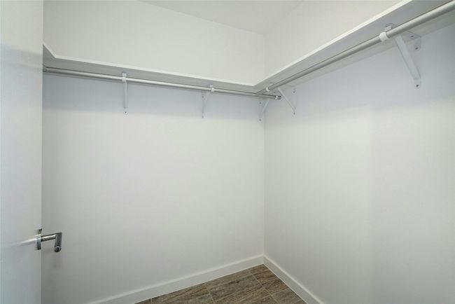 View of spacious closet | Image 28