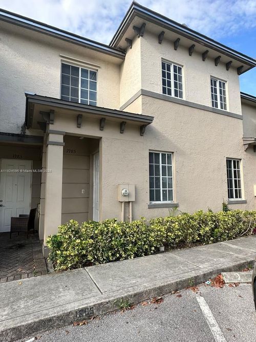 1985 Marsh Harbor Dr, Riviera Beach, FL, 33404-6437 | Card Image