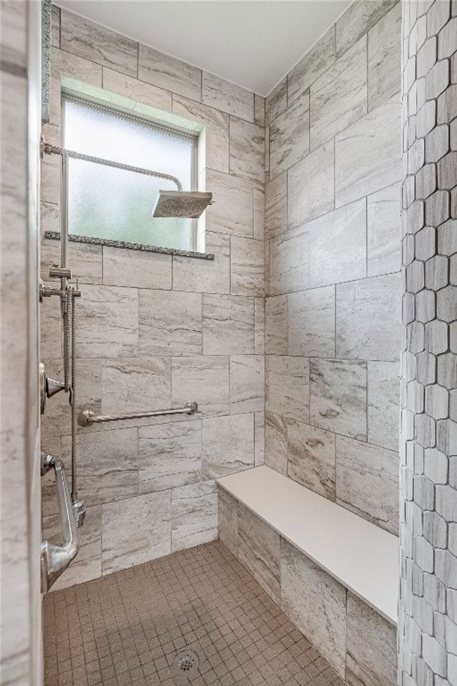 Bathroom with a tile shower | Image 28