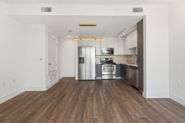 Bright and airy design with high ceilings and clean sightlines to the living area. | Image 16