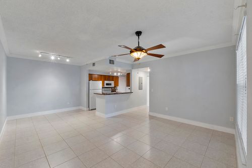 104-5980 W Sample Rd, Coral Springs, FL, 33067-3258 | Card Image