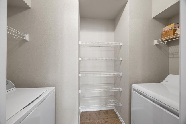 Washroom featuring washer and dryer | Image 14