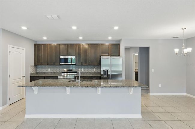 15250 Aquarius Way, House other with 3 bedrooms, 2 bathrooms and null parking in MASCOTTE FL | Image 8