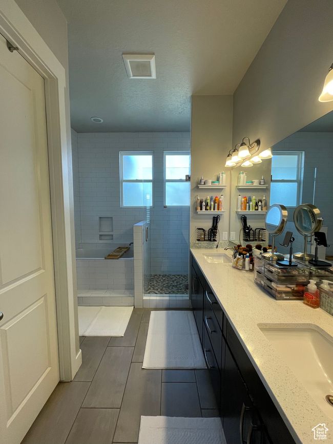 Full master bath with double vanity, a garden tub, tiled shower. | Image 32