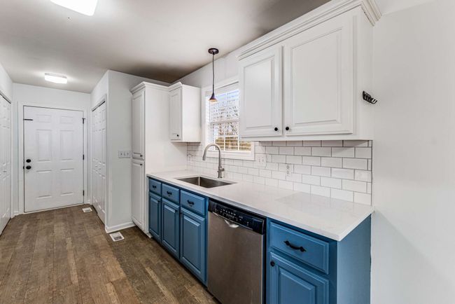 New sink and faucet along with new quartz countertops and backsplash | Image 11