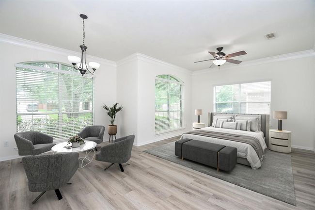 Directly across your dining room is a 16' x 21' flex room with an attached full bath you can convert to whatever you need: as a mother-in-law suite, or even as a library, home office or formal living - you name it! Note that light fixtures throughout your new home have just been updated this year! | Image 5