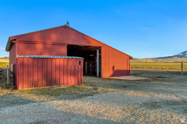 View of chicken coop in the front and barn in the back | Image 12