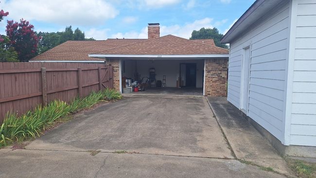 Garage featuring driveway | Image 25