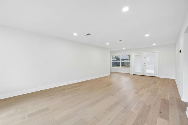 Spare room featuring recessed lighting and light wood-style floors | Image 6