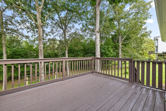 Spacious deck overlooking backyard | Image 29
