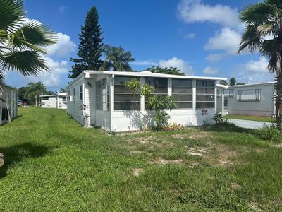 8 Se Casa Rio Road, House other with 3 bedrooms, 2 bathrooms and null parking in Port St Lucie FL | Image 2